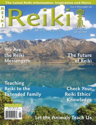 Reiki News Magazine Winter 2015 cover featuring a serene mountain lake reflection.