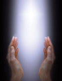 Two hands held open toward a glowing vertical beam of white light against a dark background.