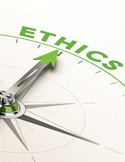A close-up of a compass needle pointing directly toward the word "ETHICS" in green text.