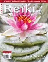 Reiki News Summer 2021 featuring a pink lotus flower on a stone surface.