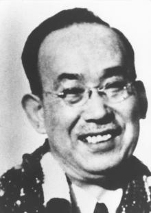 Black-and-white portrait of Dr. Chujiro Hayashi shown from the shoulders up.