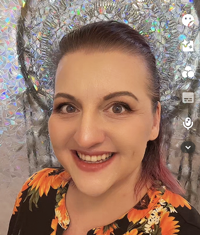 Portrait of Tonya Baird, Reiki Retreat Team.